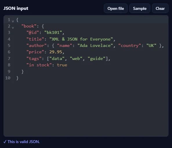 The JSON input box filled with sample JSON, with Open file, Sample and Clear buttons, and the message “This is valid JSON” below it.
