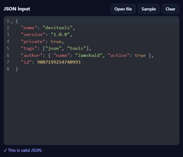 The JSON input box filled with sample JSON, with Open file, Sample and Clear buttons, and the message “This is valid JSON” below it.