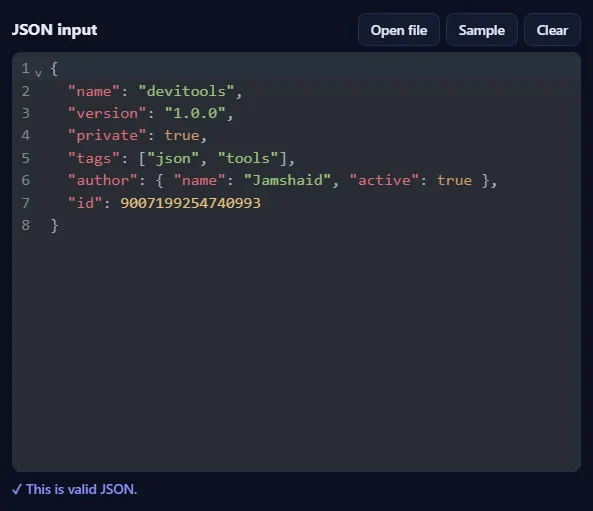 The JSON input box filled with sample JSON, with Open file, Sample and Clear buttons, and the message “This is valid JSON” below it.